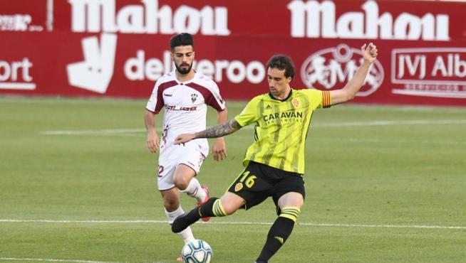 Imágenes del partido disputado este viernes por el Real Zaragoza en el Estadio Carlos Belmonte de Albacete.