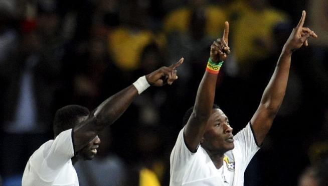 Jugadores de Ghana, durante el partido contra Serbia