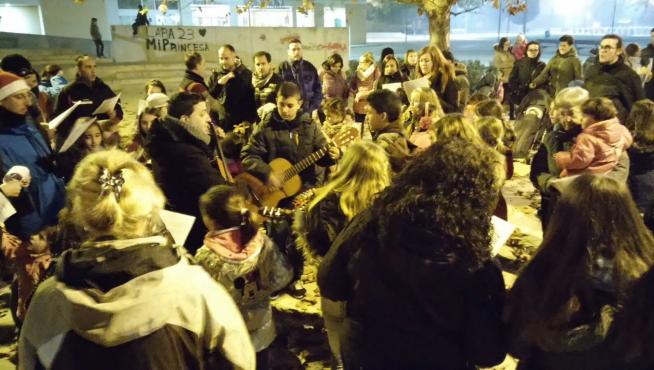 Pasacalles navideño, acto de arranque de la celebración de la Navigoya en el barrio Parque Goya de Zaragoza.