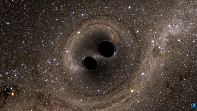 Simulación de la fusión de los dos agujeros negros de los que proceden las ondas gravitacionales detectadas desde el observatorio Ligo (Estados Unidos).