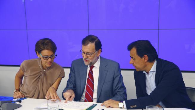 Rajoy, junto a Dolores de Cospedal y Martínez Maíllo, durante la Junta Directiva Nacional del PP.