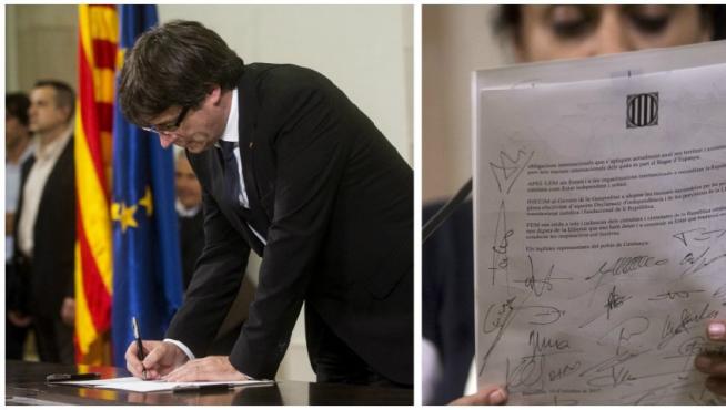 Puigdemont, Gabriel y Junqueras firmando la declaración.