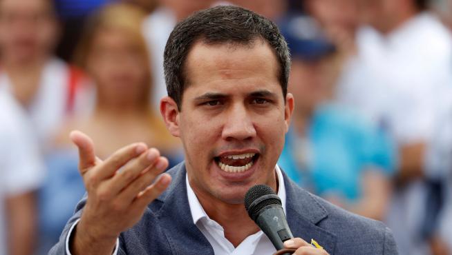 FILE PHOTO: Venezuelan opposition leader Juan Guaido, who many nations have recognised as the country's rightful interim ruler, speaks during a swearing-in ceremony for supporters in Caracas, Venezuela April 27, 2019. REUTERS/Carlos Garcia Rawlins/File Photo [[[REUTERS VOCENTO]]] VENEZUELA-POLITICS/