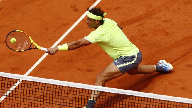 Nadal, en acción contra Federer.