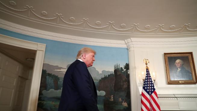 U.S. President Donald Trump arrives to speak about the shootings in El Paso and Dayton in the Diplomatic Room of the White House in Washington, U.S., August 5, 2019. REUTERS/Leah Millis TPX IMAGES OF THE DAY [[[REUTERS VOCENTO]]] USA-SHOOTING/TRUMP