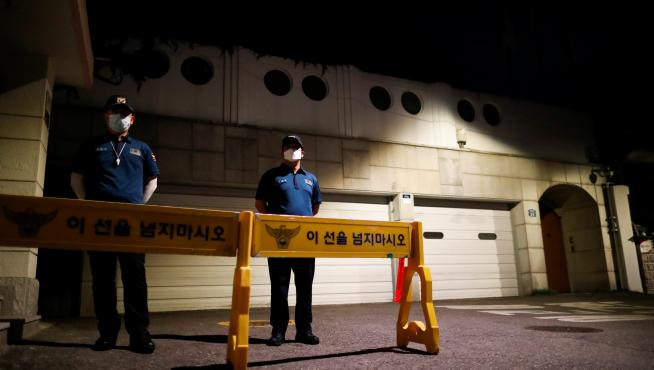 Rescue workers conduct a search operation for Seoul Mayor Park Won-soon in Seoul