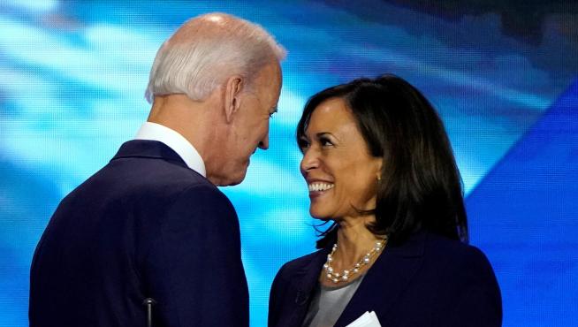 FILE PHOTO: Former Vice President Biden talks with Senator Harris after the conclusion of the 2020 Democratic U.S. presidential debate in Houston