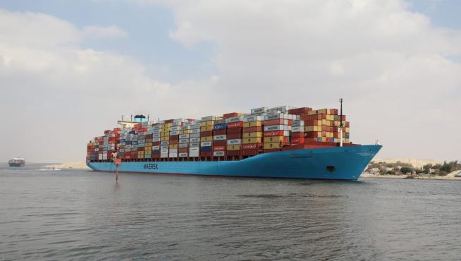 A container ship sails at the Suez Canal, in Ismailia