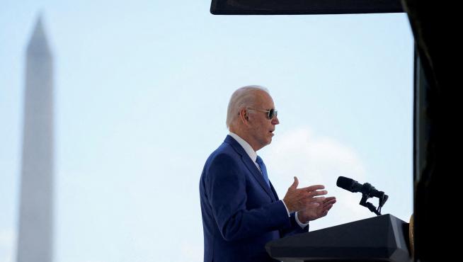 FILE PHOTO: President Joe Biden speaks before signing two bills aimed at combating fraud in the COVID-19 small business relief programs in Washington
