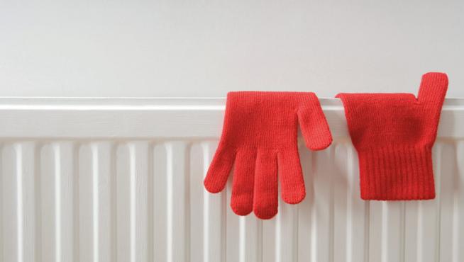 Gloves drying on a radiator