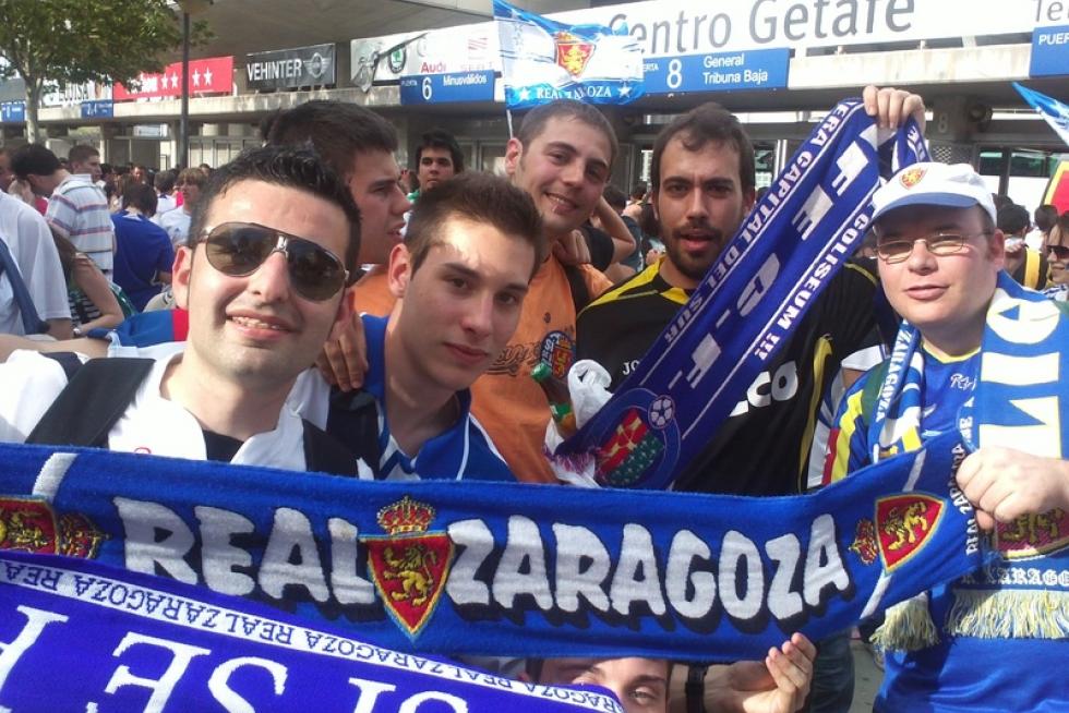 Los zaragocistas muestran cómo vivieron la noche de la salvación en Getafe.