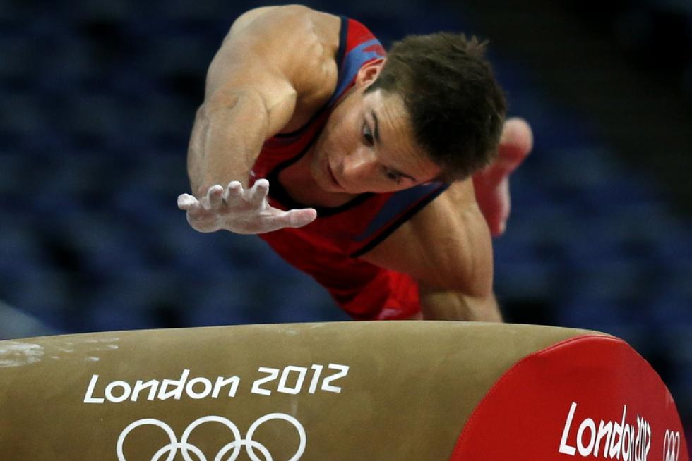 Los gimnastas se ponen a punto antes del comienzo de los Juegos.