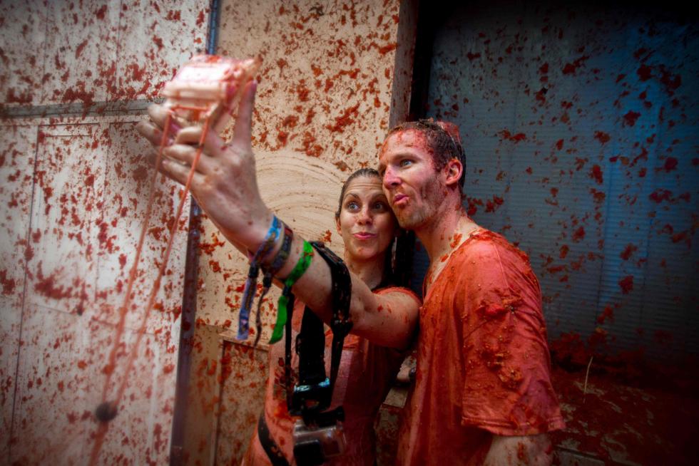 La tomatina de Buñol cumple su rito anual