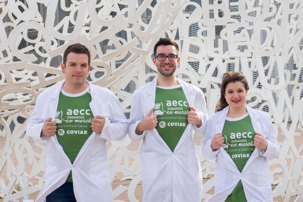 Los aragoneses Pablo Jiménez Schuhmacher (38), Eduardo Ruiz López (24) e Inés Bolsa Ferrer (22) le ponen cara a la investigación con motivo de la V Marcha contra el Cáncer.