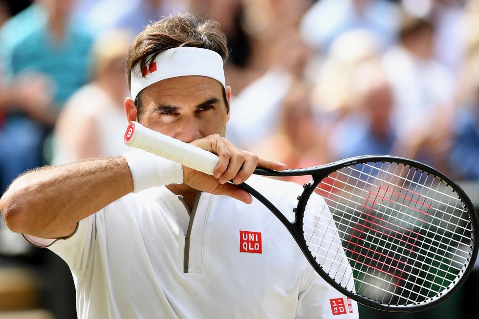 Wimbledon (United Kingdom), 14/07/2019.- Roger Federer of Switzerland in action against Novak Djokovic of Serbia during their Men's final match for the Wimbledon Championships at the All England Lawn Tennis Club, in London, Britain, 14 July 2019. (Tenis, Suiza, Reino Unido, Londres) EFE/EPA/ADRIAN DENNIS / POOL EDITORIAL USE ONLY/NO COMMERCIAL SALES Wimbledon Championships