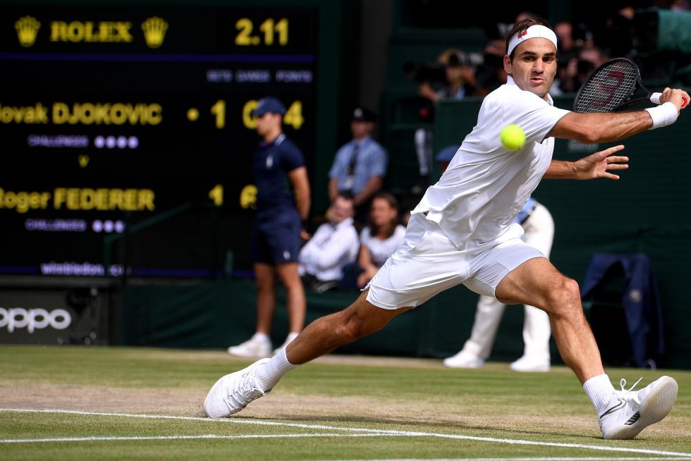 Wimbledon (United Kingdom), 14/07/2019.- Novak Djokovic of Serbia in action against Roger Federer of Switzerland during their Men's final match for the Wimbledon Championships at the All England Lawn Tennis Club, in London, Britain, 14 July 2019. (Tenis, Suiza, Reino Unido, Londres) EFE/EPA/ADRIAN DENNIS / POOL EDITORIAL USE ONLY/NO COMMERCIAL SALES Wimbledon Championships