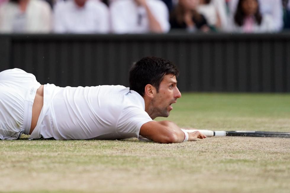 Wimbledon (United Kingdom), 14/07/2019.- Novak Djokovic of Serbia in action against Roger Federer of Switzerland during their Men's final match for the Wimbledon Championships at the All England Lawn Tennis Club, in London, Britain, 14 July 2019. (Tenis, Suiza, Reino Unido, Londres) EFE/EPA/WILL OLIVER EDITORIAL USE ONLY/NO COMMERCIAL SALES Wimbledon Championships