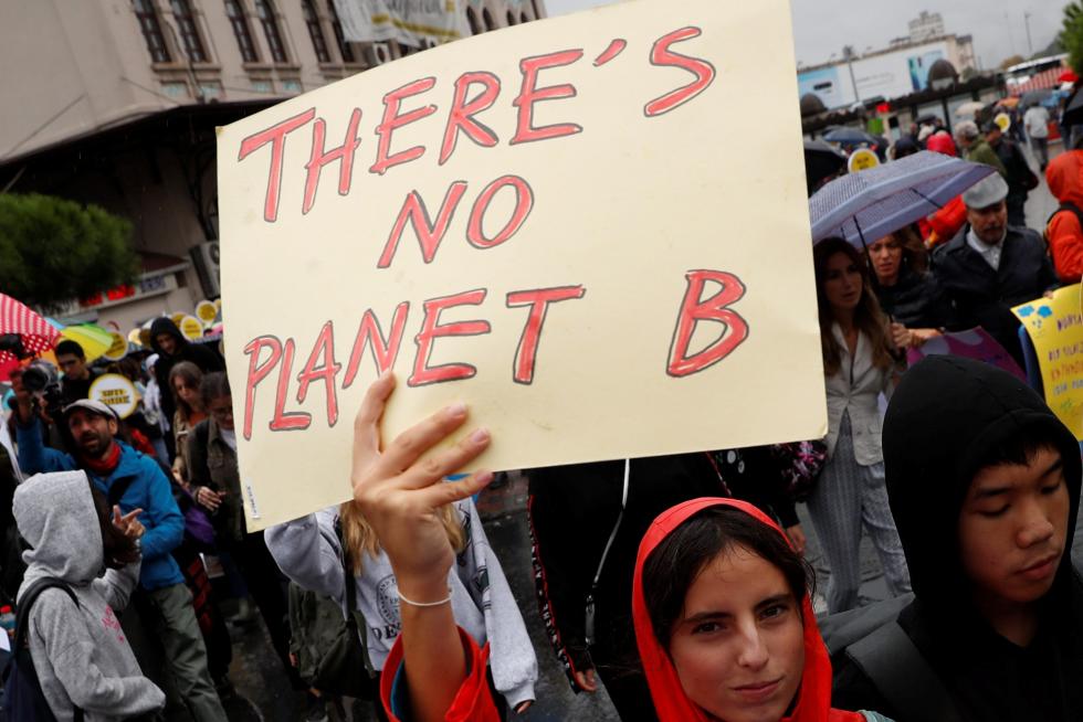 Tirana (Albania), 20/09/2019.- Citiziens and members of different non-government organistation hold posters and wear masks, as they take part in a protest against climate change in Tirana, Albania, 20 September 2019. Albania has joined the protest against climate changing like million of people around the world under the movement Friday for the Future and Climate Strike. (Protestas) EFE/EPA/MALTON DIBRA Climate strike in Albania