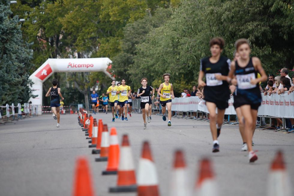 La Carrera de la Infancia de Zaragoza ha celebrado este domingo su decimocuarta edición con la participación de más de 1.100 niños en el Parque José Antonio Labordeta.