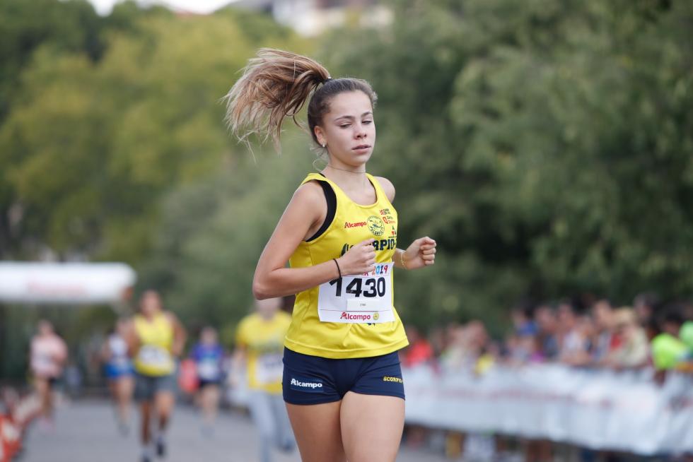 La Carrera de la Infancia de Zaragoza ha celebrado este domingo su decimocuarta edición con la participación de más de 1.100 niños en el Parque José Antonio Labordeta.