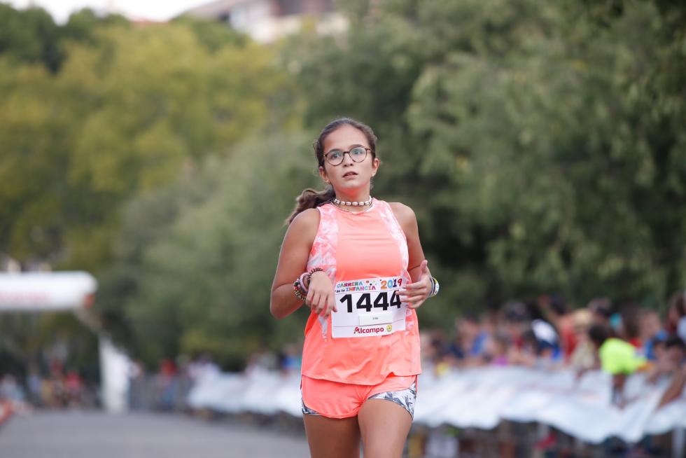 La Carrera de la Infancia de Zaragoza ha celebrado este domingo su decimocuarta edición con la participación de más de 1.100 niños en el Parque José Antonio Labordeta.