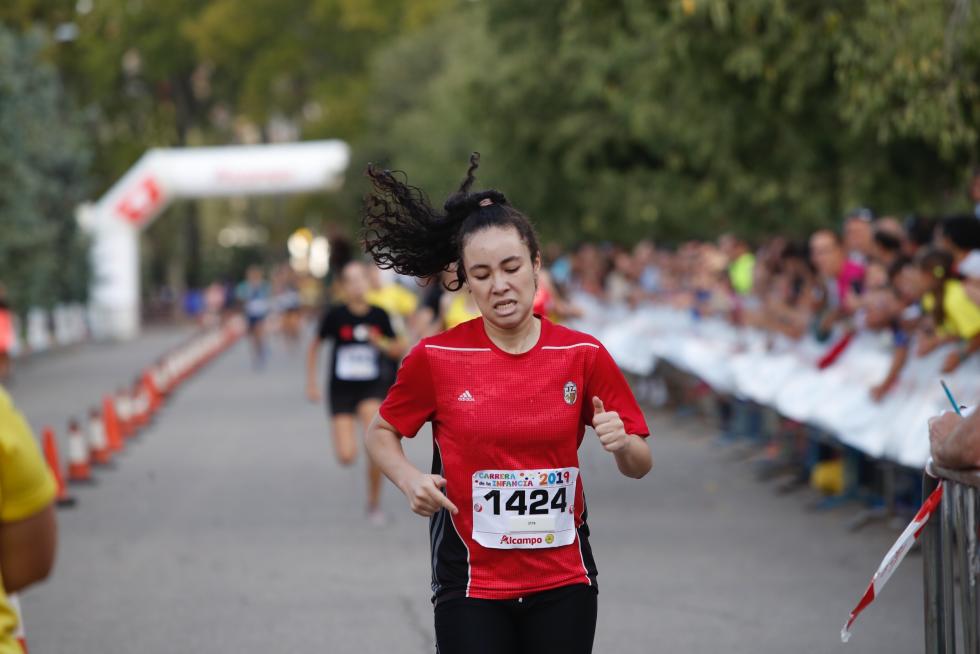 La Carrera de la Infancia de Zaragoza ha celebrado este domingo su decimocuarta edición con la participación de más de 1.100 niños en el Parque José Antonio Labordeta.
