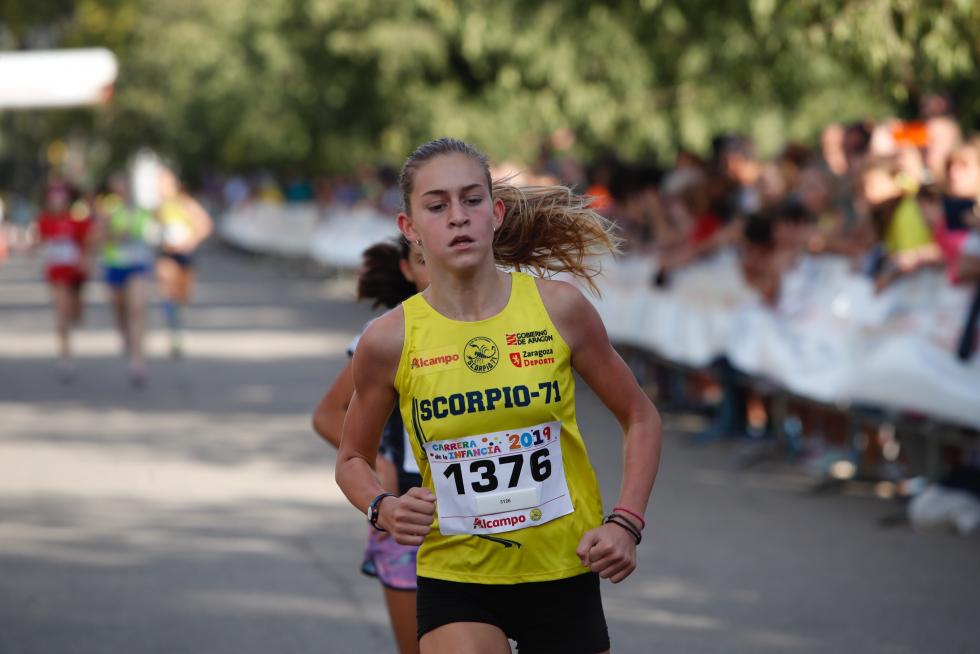La Carrera de la Infancia de Zaragoza ha celebrado este domingo su decimocuarta edición con la participación de más de 1.100 niños en el Parque José Antonio Labordeta.
