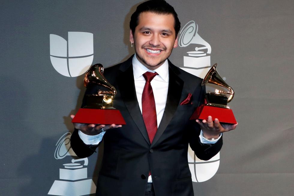 Las Vegas (United States), 15/11/2019.- Kany Garcia poses with the Best Singer/Songwriter Album and Best Short Form Music Video awards in the press room during the 20th annual Latin Grammy Awards ceremony at the MGM Grand Garden Arena in Las Vegas, Nevada, USA, 14 November 2019. The Latin Grammys recognize artistic and/or technical achievement, not sales figures or chart positions, and the winners are determined by the votes of their peers - the qualified voting members of the Latin Recording Academy. (Estados Unidos) EFE/EPA/NINA PROMMER Press Room - 20th Latin Grammy Awards