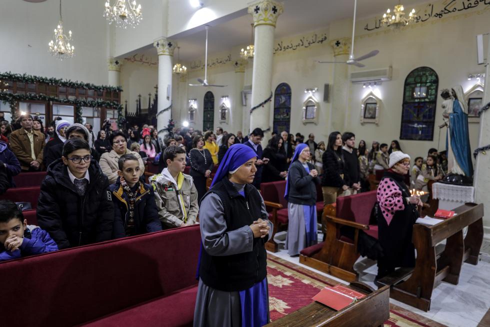 Gaza City (-), 24/12/2019.- Church scouts play outside the Latin Church in Gaza during the midnight Christmas mass, Gaza City, 24 December 2019. EFE/EPA/HAITHAM IMAD Christmas mass in Gaza