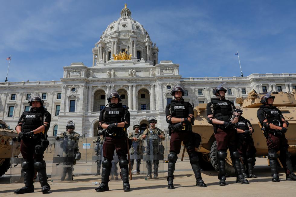 People rally against the death in Minneapolis police custody of George Floyd, in St. Paul