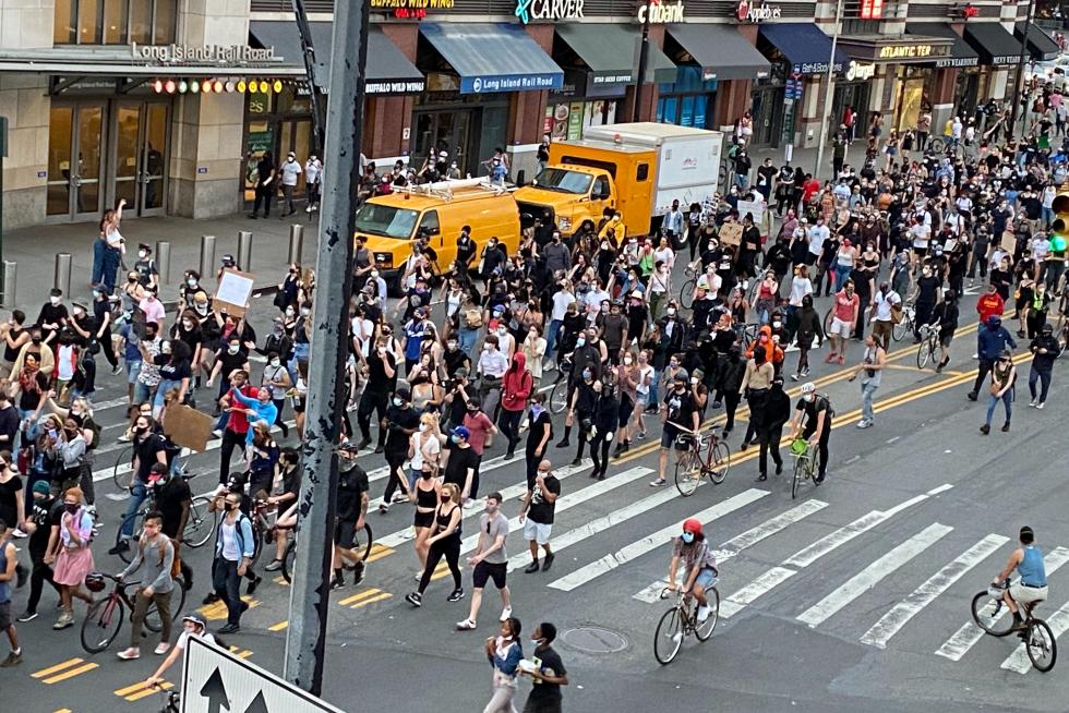 Protesters march on Flatbush Avenue in Brooklyn