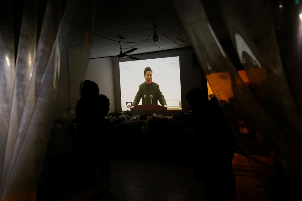 The Wider Image: 'I've let them down': Beijing's migrant workers miss family reunions on Lunar New Year