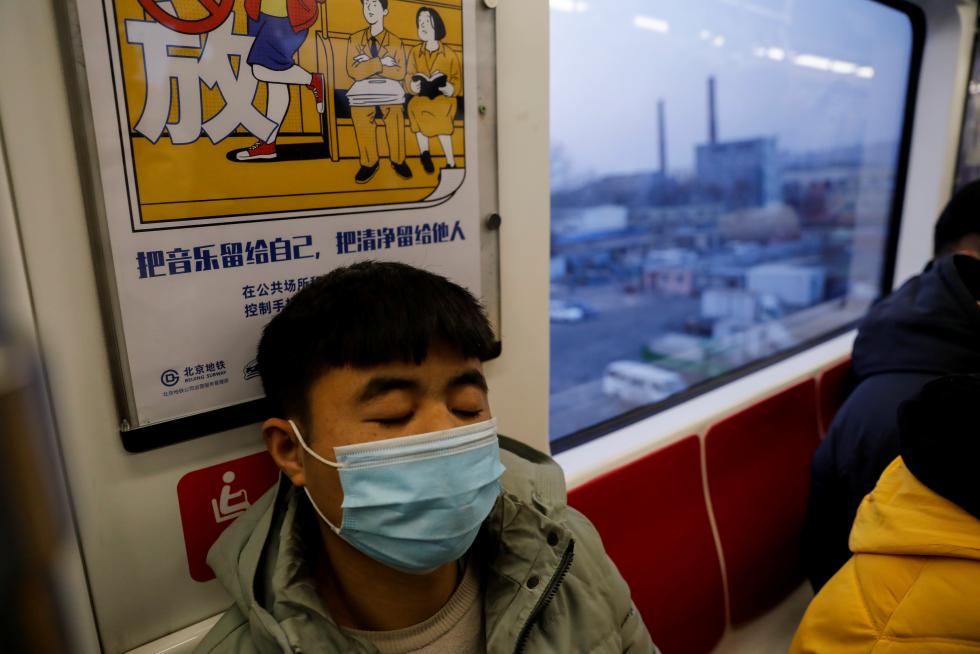 The Wider Image: 'I've let them down': Beijing's migrant workers miss family reunions on Lunar New Year
