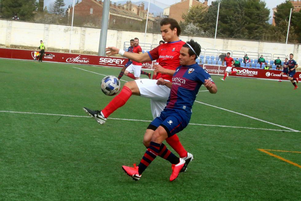 Público en el partido de Tercera División entre Huesca B y Cariñena.