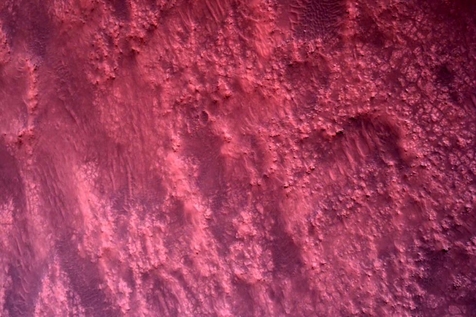 The surface of Mars directly below NASA's Mars Perseverance rover is seen using the Rover Down-Look Camera