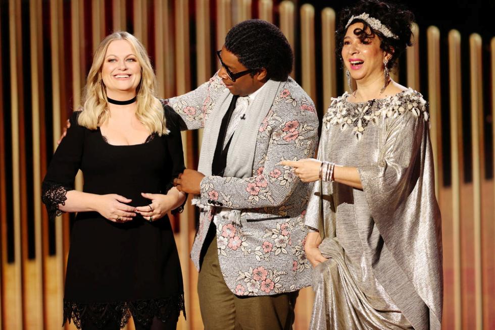Andra Day (C) reacts after being announced winner of the Best Actress - Motion Picture Drama award for The AWARDS-GOLDENGLOBES/