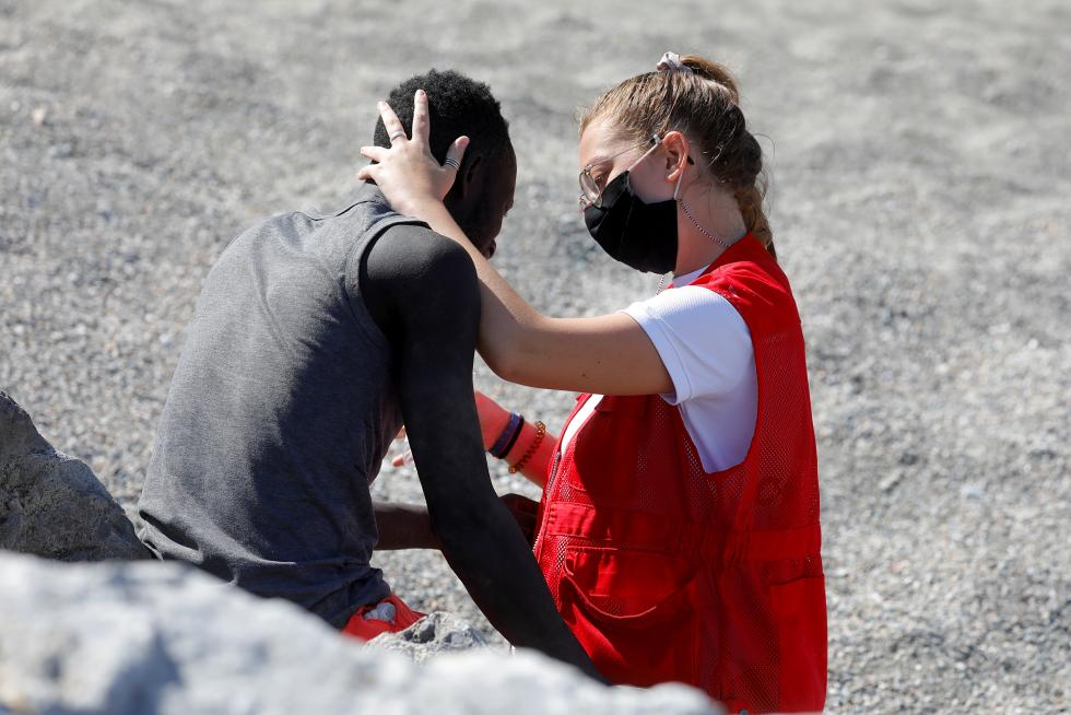 Thousands of migrants cross the Spanish-Moroccan border