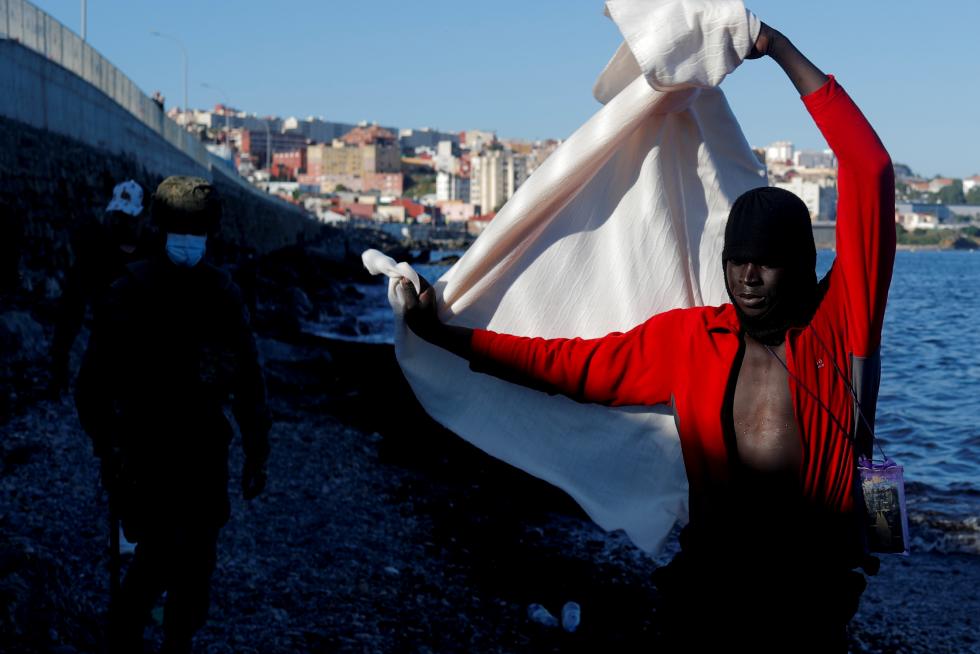 Thousands of migrants cross the Spanish-Moroccan border