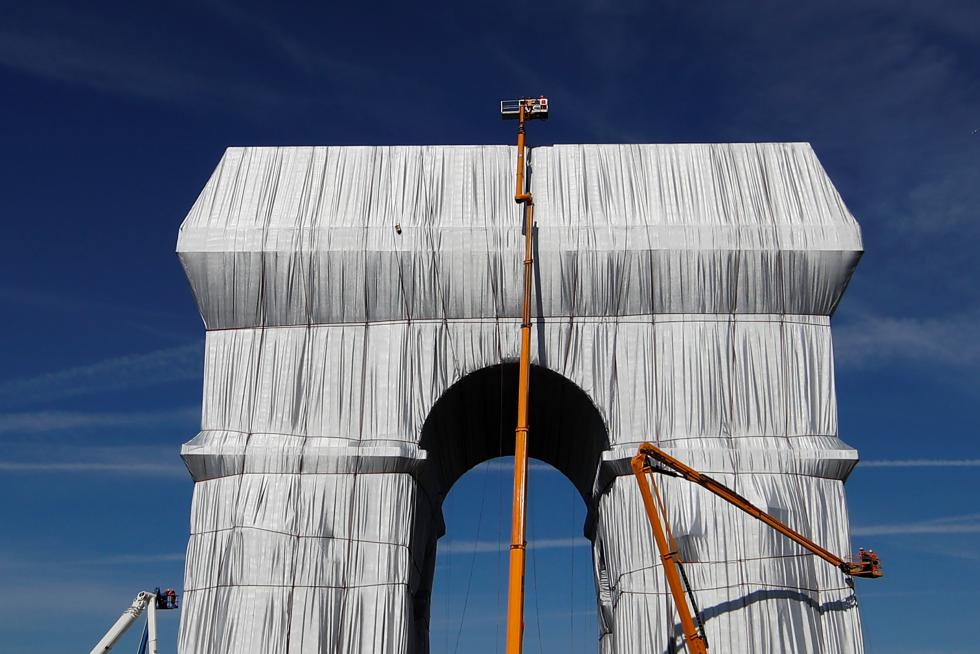 Arc de Triomphe enveloped by a shimmering wrapper in a posthumous installation by artist Christo