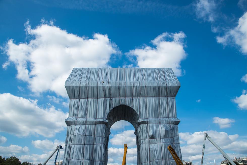 Wrapping of landmark Arc de Triomphe monument in Paris