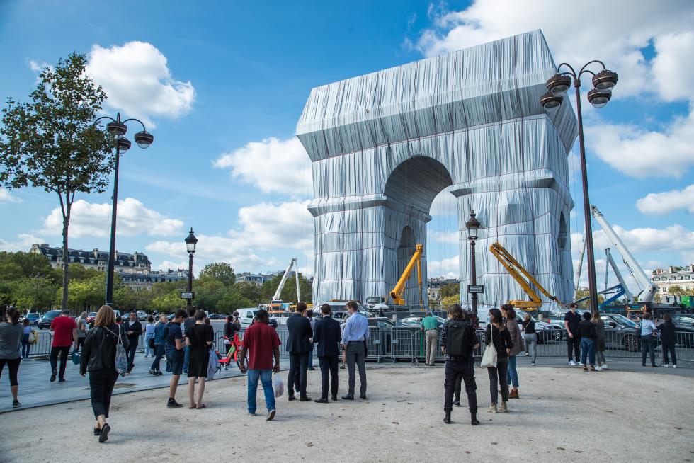 Wrapping of landmark Arc de Triomphe monument in Paris