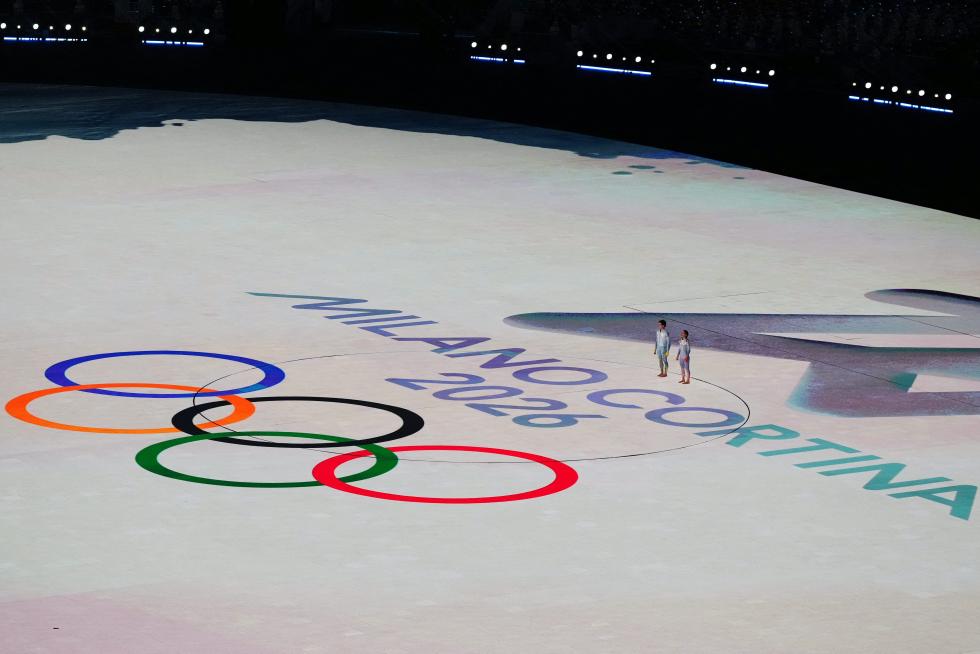 2022 Beijing Olympics - Closing Ceremony - National Stadium, Beijing, China - February 20, 2022. A snowflake and national flags are seen during the closing ceremony. REUTERS/David W Cerny OLYMPICS-2022-CLOSING/