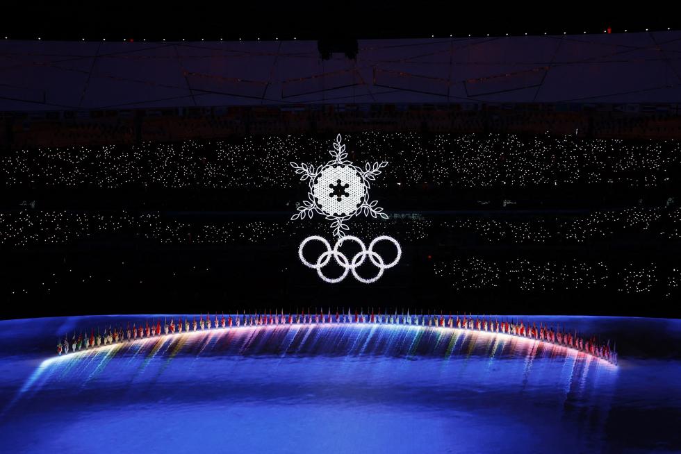 2022 Beijing Olympics - Closing Ceremony - National Stadium, Beijing, China - February 20, 2022. A snowflake and national flags are seen during the closing ceremony. REUTERS/David W Cerny OLYMPICS-2022-CLOSING/