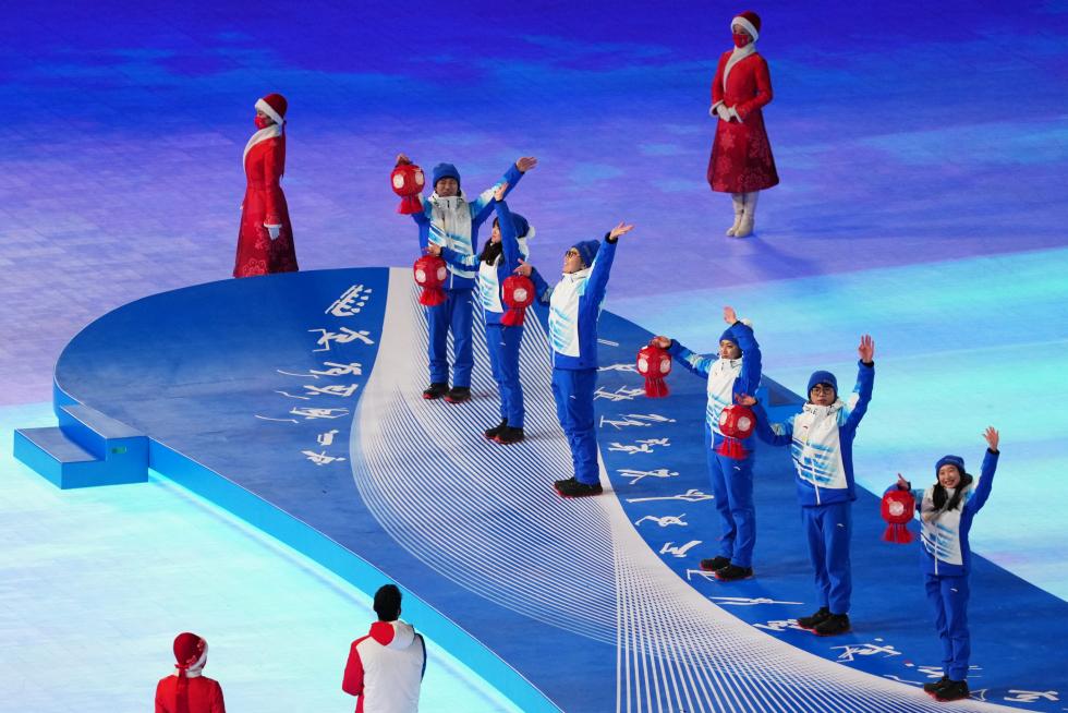 2022 Beijing Olympics - Closing Ceremony - National Stadium, Beijing, China - February 20, 2022. A snowflake the Olympic rings and national flags are seen during the closing ceremony. REUTERS/David W Cerny OLYMPICS-2022-CLOSING/