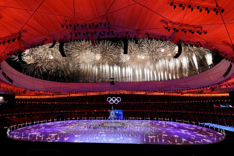 2022 Beijing Olympics - Closing Ceremony - National Stadium, Beijing, China - February 20, 2022. Fireworks explode and spell One World above the stadium during the closing ceremony. REUTERS/David W Cerny TPX IMAGES OF THE DAY OLYMPICS-2022-CLOSING/