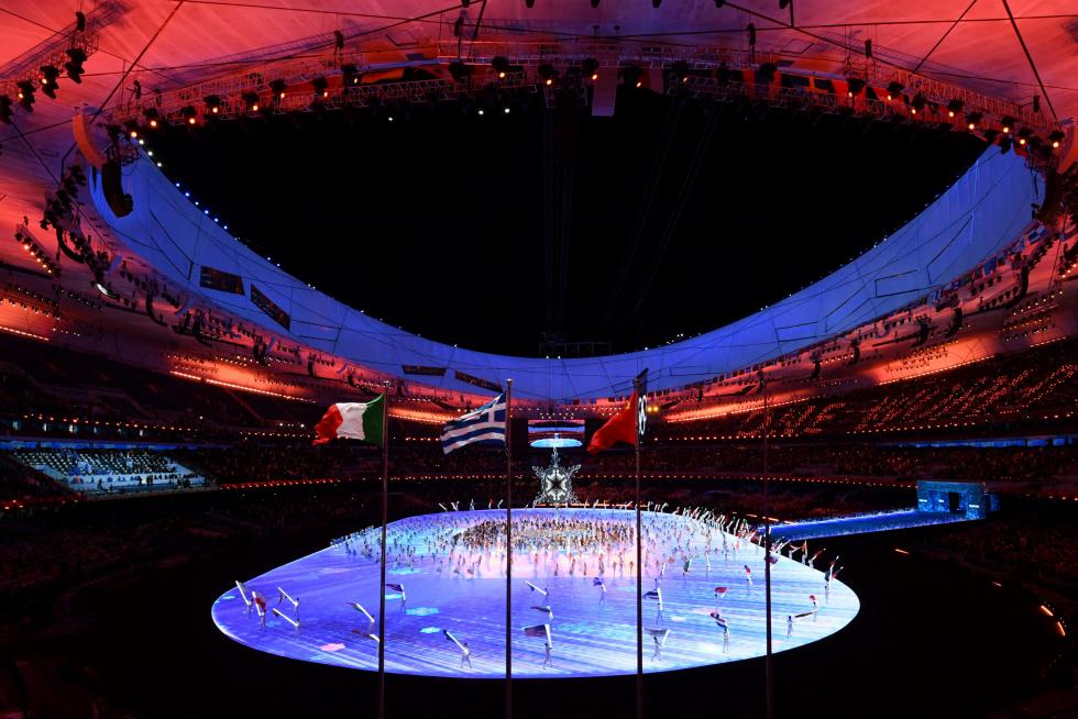 2022 Beijing Olympics - Closing Ceremony - National Stadium, Beijing, China - February 20, 2022. General view of China athletes waving their flag during the closing ceremony. REUTERS/Kim Hong-Ji TPX IMAGES OF THE DAY OLYMPICS-2022-CLOSING/
