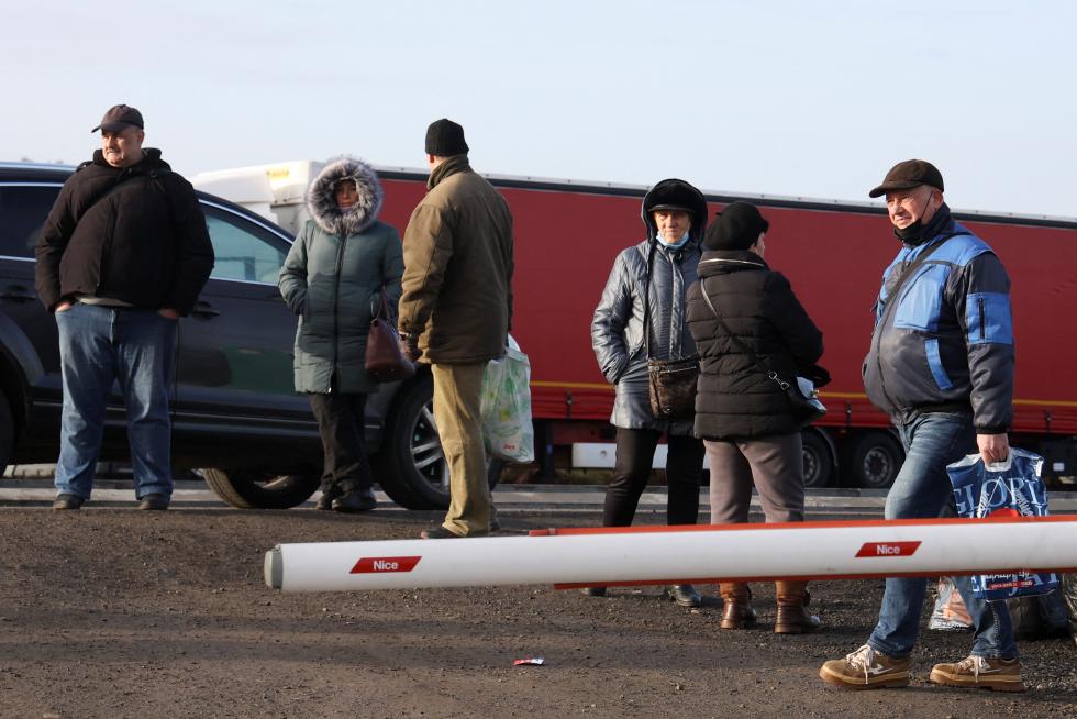 Los ciudadanos ucranianos en la frontera con Polonia.
