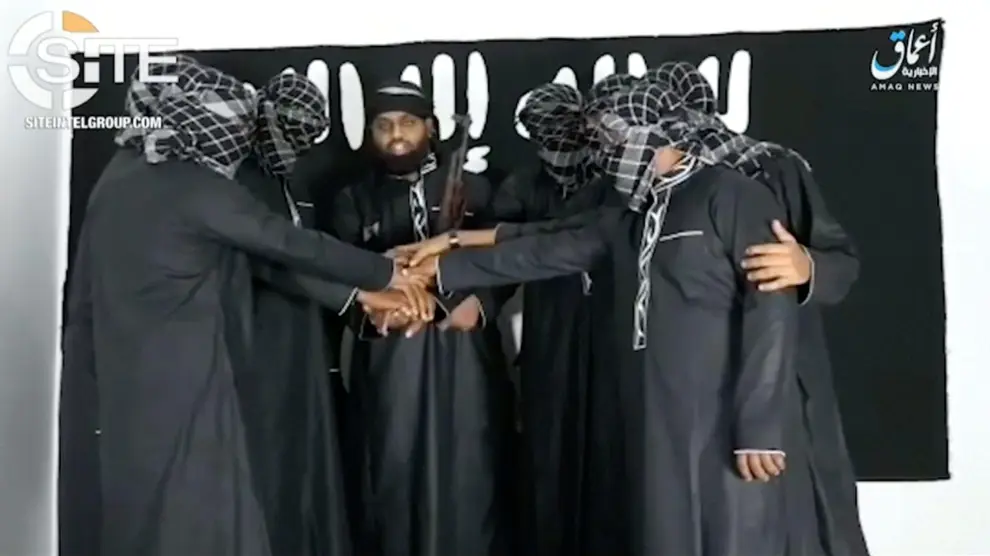 A group of men purported to be the the Sri Lanka bomb attackers is seen at an unknown location in this still image taken from video uploaded by the Islamic State's AMAQ news agency April 23, 2019 and received by Reuters via SITE Intel Group. Video uploaded April 23, 2019.  AMAQ via SITE INTEL GROUP/Handout via REUTERS TV    ATTENTION EDITORS - THIS IMAGE HAS BEEN SUPPLIED BY A THIRD PARTY. NO RESALES. NO ARCHIVES      TPX IMAGES OF THE DAY [[[REUTERS VOCENTO]]] SRI LANKA-BLASTS/