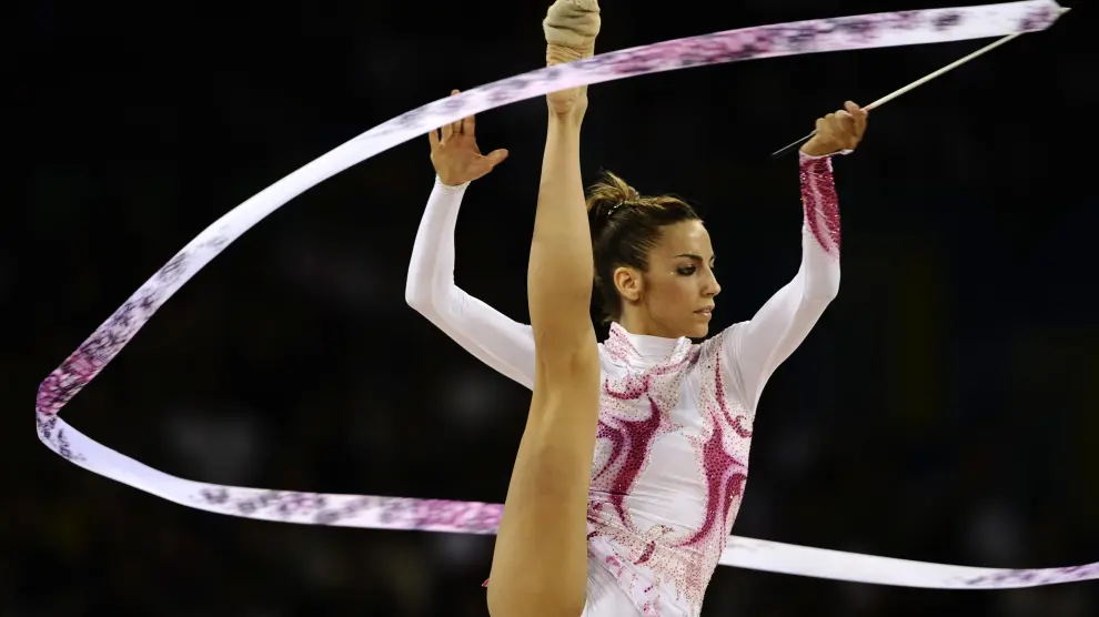 Spain's Almudena Cid competes in the individual all-around final of the rhythmic gymnastics at the Beijing 2008 Olympic Games in Beijing on August 23, 2008. AFP PHOTO / FRANCK FIFE OLY-2008-GYMNASTICS-RHYTHMIC-FINAL-ESP