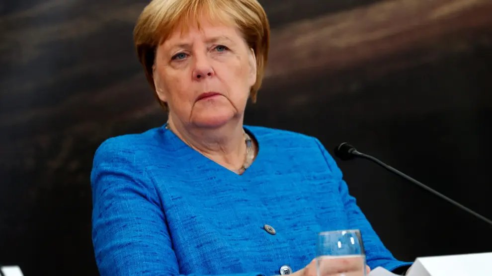 REFILE - ADDING INFORMATION German Chancellor Angela Merkel looks on at a news conference during the annual informal summer meeting of the Nordic prime ministers in Reykjavik, Iceland August 20, 2019. REUTERS/Ints Kalnins [[[REUTERS VOCENTO]]] GERMANY-MERKEL/ICELAND